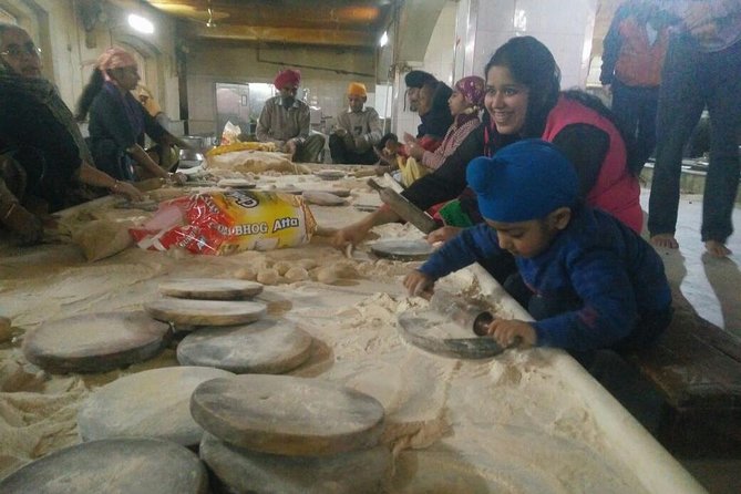 Explore the Beauty of Old Delhi & the Spice Market! - The paratha snack and bottled water: small inclusions that keep you going