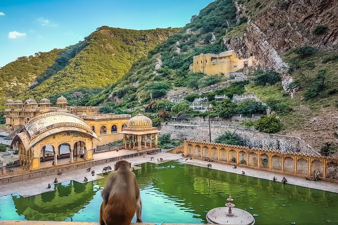 Four days Golden Triangle Luxury Tour with Dinner to Agra and Jaipur from Delhi - Day 1 in Delhi: Jama Masjid, Bangla Sahib, Qutub Minar, and a photo stop at the Lotus Temple