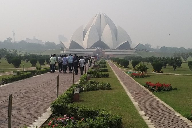 Full Day Tour of Delhi With Guide & Entrances - Getting started right: pickup, AC comfort, and mobile tickets