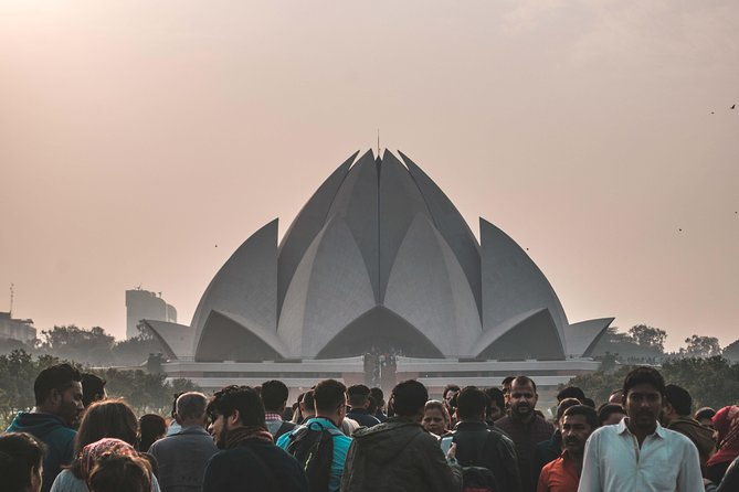 Half-Day Delhi Temple Tour with Pick-Up & Drop-Off - The guide and vehicle: where the tour turns from sightseeing into understanding