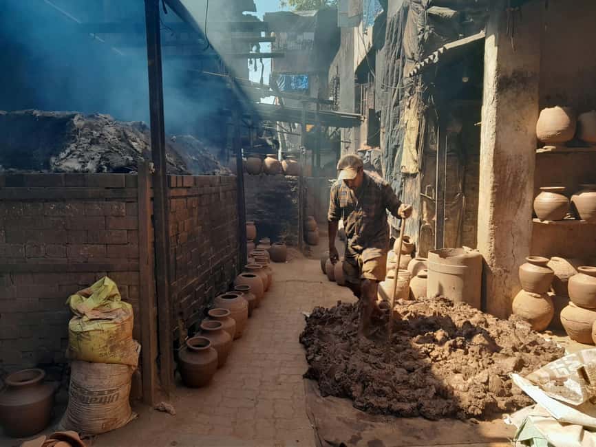 Mumbai: 2 hours Dharavi Slum Tour with Local Guide - Recycling, leather, garments, and pottery: the work behind the label