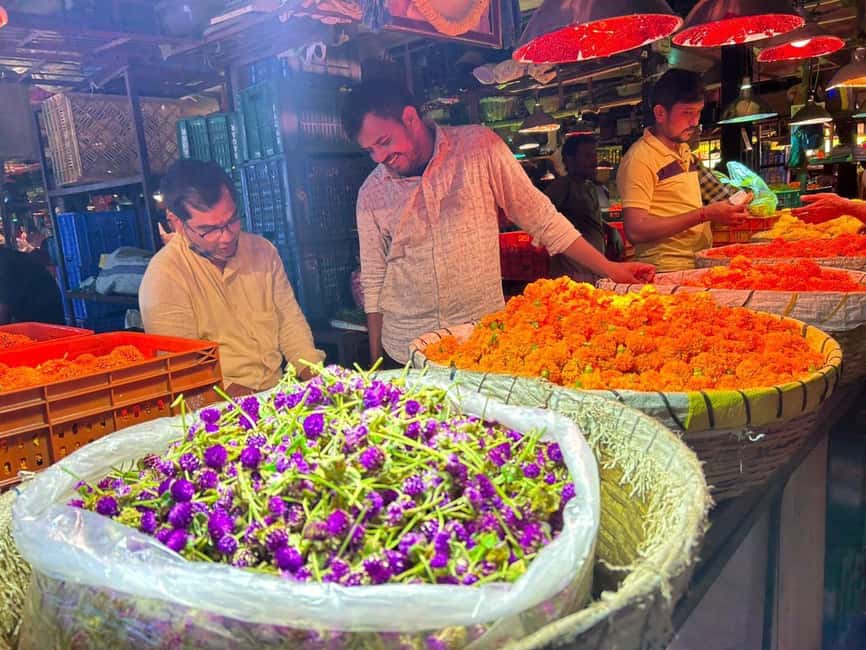 Mumbai by Dawn: Market Tour of Flowers, Fish, and More - Hotel pickup and the included local train ride: how you save time