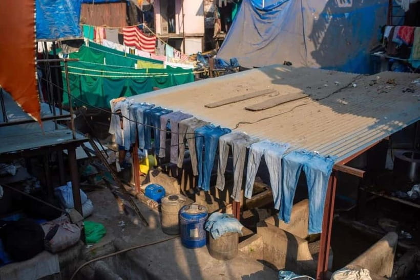 Mumbai: Dharavi Slum and Dhobi Ghat Laundry Tour - Dharavi street walk: leather, Kumbhar Wada pottery, and plastic recycling