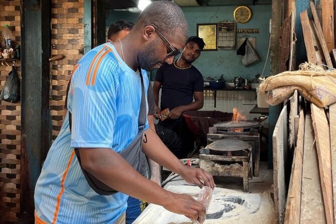 Private Guided Walking Tour in Dharavi Slums - Stop 3 in Dharavi bylanes: daily life plus tannery work and leather production
