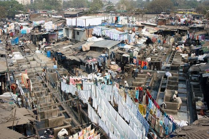 Private Mumbai Sightseeing Tour Including Dharavi Slum - Jain Temple, Kamala Nehru Park, and Hanging Gardens over water tanks