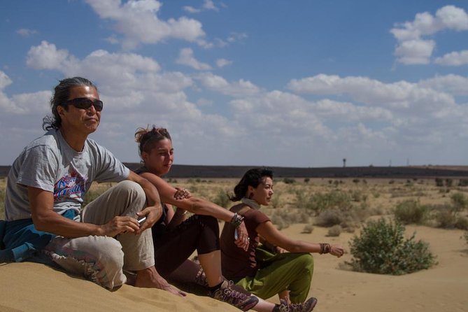 Shahi Half day non touristic sand dune camel safari with dinner - Riding toward sunset in the Thar Desert dunes