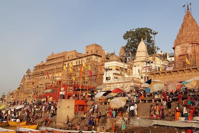 Varanasi Experience 01 Night -02 Days Tour - Manikarnika Ghat: a short, serious stop at a hallowed cremation ground