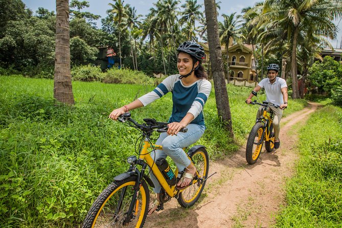 Varca Coastal E-Bike Tour: Scenic Beachside Adventure - Orlim bridge and fishing activity on the ride back